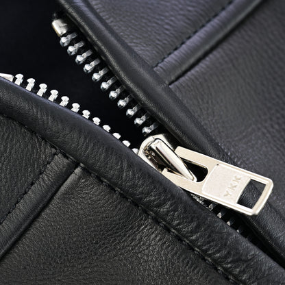 Close-up of snap closures and concealed carry pocket stitching – Sucka Free vest